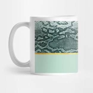 Coloured snake print on green, golden lining Mug